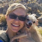 Belinda - Credentialed Veterinary Technician with cream dog